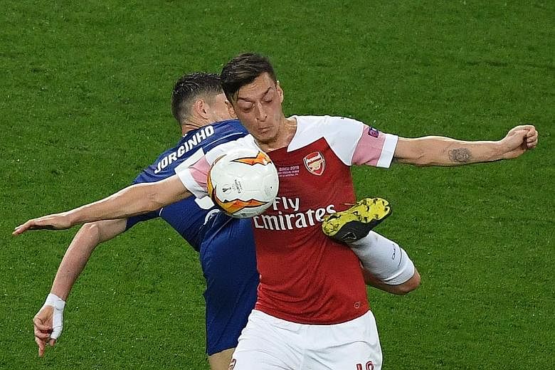 In this 4-1 Europa League final defeat by Chelsea on May 29, Mesut Ozil struggled to make an impact, as he did all season. Former Gunner Robert Pires is urging Arsenal fans to be patient with the enigmatic playmaker, who can help his own cause by sco
