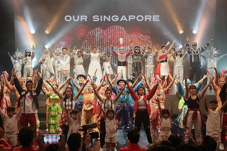 National Day Parade performers, including children, singing and dancing to this year's finale segment theme song, Our Singapore, in a preview yesterday at the Victoria Theatre. Artists, including Jacintha Abisheganaden and Rahimah Rahim, will lead th