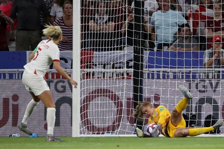 US goalkeeper Alyssa Naeher saving a penalty from England's Steph Houghton for her team to prevail 2-1 in the Women's World Cup semi-final in Lyon, France. For the third tournament running, England will play for third place. PHOTO: REUTERS