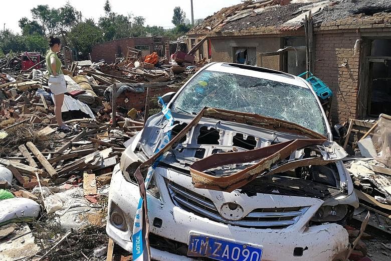 The damage caused by a rare tornado in Kaiyuan city, in China's north-eastern Liaoning province, seen yesterday. PHOTO: REUTERS