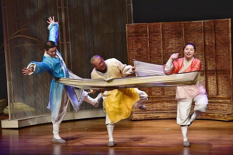 The China National Theatre for Children performing Three Monks at the opening ceremony yesterday at the China Cultural Centre. The Singapore Hokkien Huay Kuan Arts and Cultural Troupe also put up a performance. ST PHOTO: DESMOND WEE