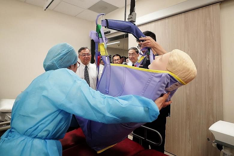 Teaching facilities at the National University Centre for Oral Health Singapore in Kent Ridge. Compared with the previous NUS Faculty of Dentistry, the new centre has an additional 18,000 sq m for training and research purposes. Health Minister Gan K