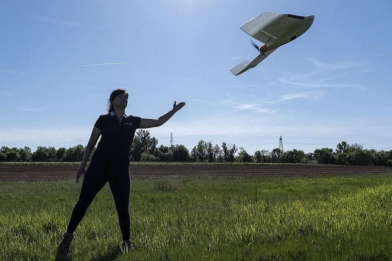 One approach to tackling the drone threat is to restrict their capabilities through geofencing. Drones commercially available to the public could be pre-programmed to avoid flying into sensitive or protected airspace. PHOTO: BLOOMBERG