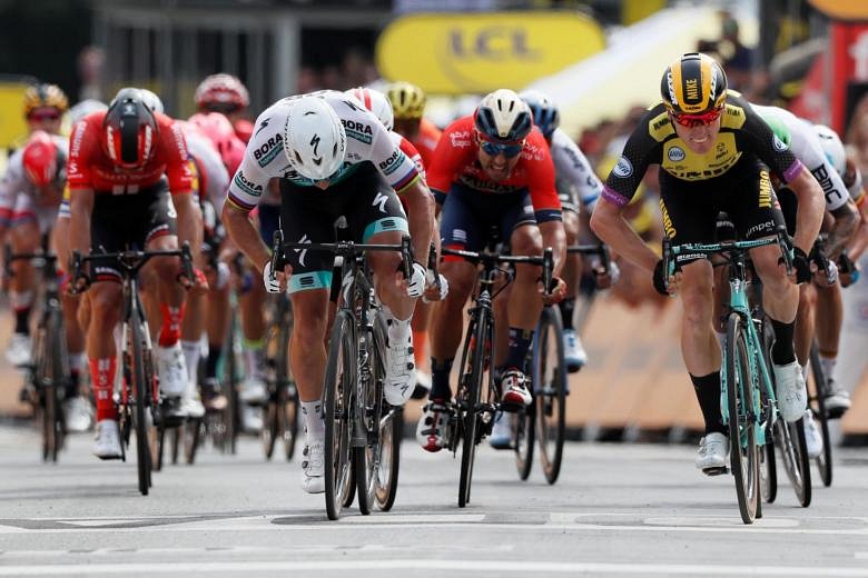 Cycling: Dutchman Teunissen surprise winner of stage 1 as Tour de ...