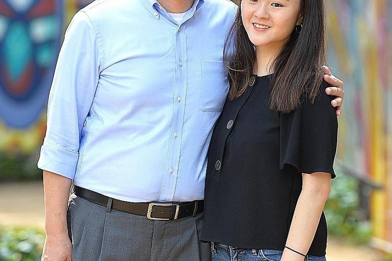 Mr Ng Kia Chiang with his daughter Kimberly, who starts work in September. Mr Ng says it is a big relief emotionally and financially that she has completed her medical degree.