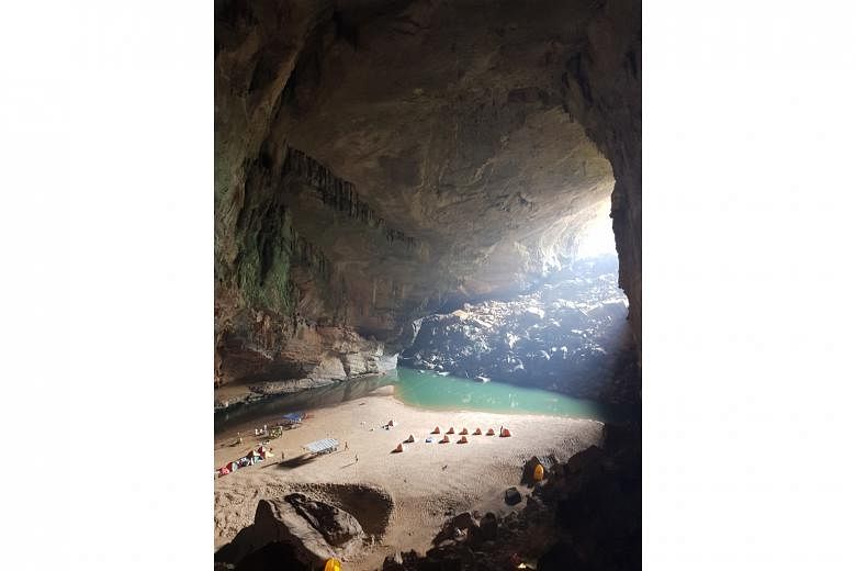 The journey to Son Doong Cave involved two days of intense trekking and a night of camping in Hang En Cave (above), the third latest cave in the world.
