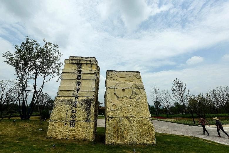 LIANGZHU CITY The city (left) was once the centre of power and belief of an early regional state during the late Neolithic period in China. PLAIN OF JARSThe megalithic archaeological landscape in Laos consists of thousands of stone jars scattered aro