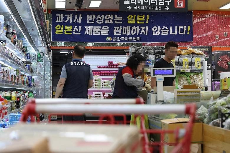 A shop in Seoul with a sign saying it does not sell Japanese products. Netizens have been encouraging South Koreans to buy locally made goods instead. PHOTO: EPA-EFE