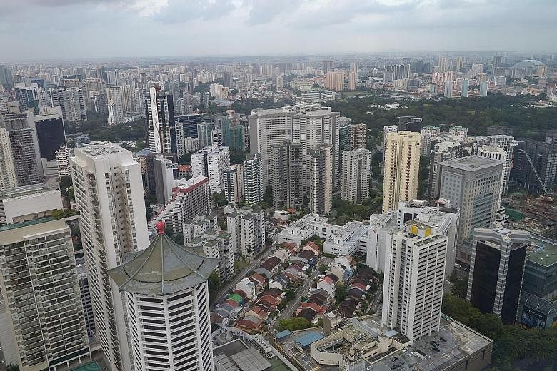 Condo resale prices in the core central region fell 0.7 per cent, while those in the outside central region retreated 0.4 per cent. Prices in the rest of central region were unchanged from May, according to estimates from SRX Property. ST FILE PHOTO
