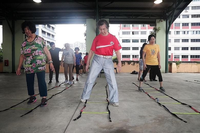 A group of seniors taking part in the Healthy Ageing Promotion Programme For You. The programme has helped many seniors become less frail and have better memory scores, researchers have found. They also improved their walking speed and balance and we