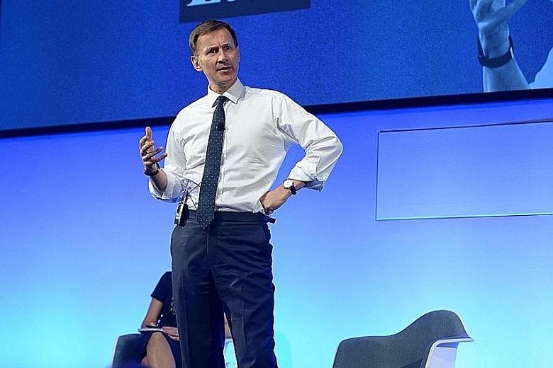 Britain's Foreign Secretary Jeremy Hunt says he is the best negotiator, the man who can be trusted to deliver Brexit and avoid the inevitable economic pain of withdrawal without an agreement. PHOTO: REUTERS
