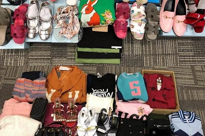 Over 500 pieces of fake luxury goods such as footwear, watches and bags were seized in raids on seven retail outlets.