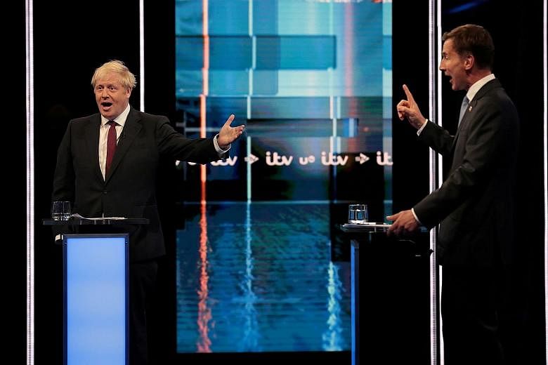 Mr Boris Johnson (left) questioned Mr Jeremy Hunt's commitment to leaving the European Union on Oct 31, while Mr Hunt criticised Mr Johnson for relying on what he said was nothing more than optimism to win a deal, in a TV debate just two weeks before