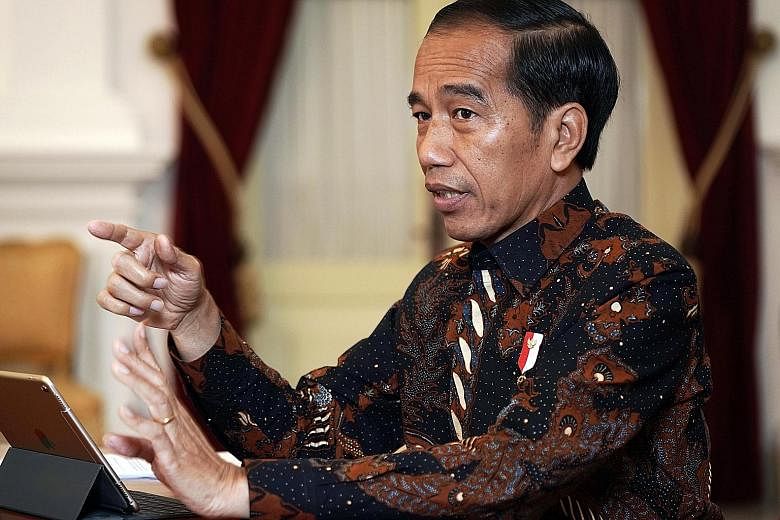 Indonesia President Joko Widodo during an interview in his Jakarta office yesterday. He has pledged to quickly lower corporate taxes, ease stringent labour laws and lift curbs on foreign ownership in more industries.