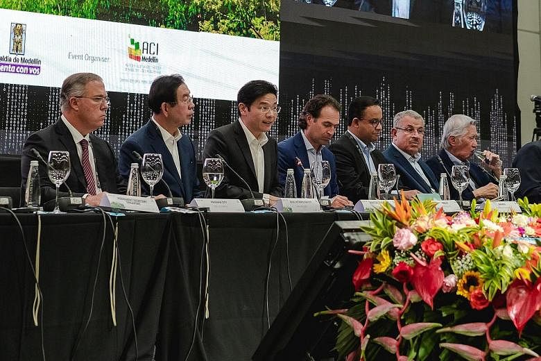National Development Minister Lawrence Wong (third from left), in his speech at the 10th World Cities Summit Mayors Forum, says Singapore tries very hard to avoid segregation by race or income.