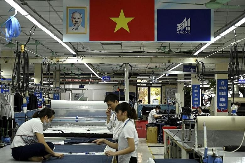 Vietnam has steadily opened up to foreign investors over the years to become a manufacturing hub in Asia. PHOTO: AGENCE FRANCE-PRESSE