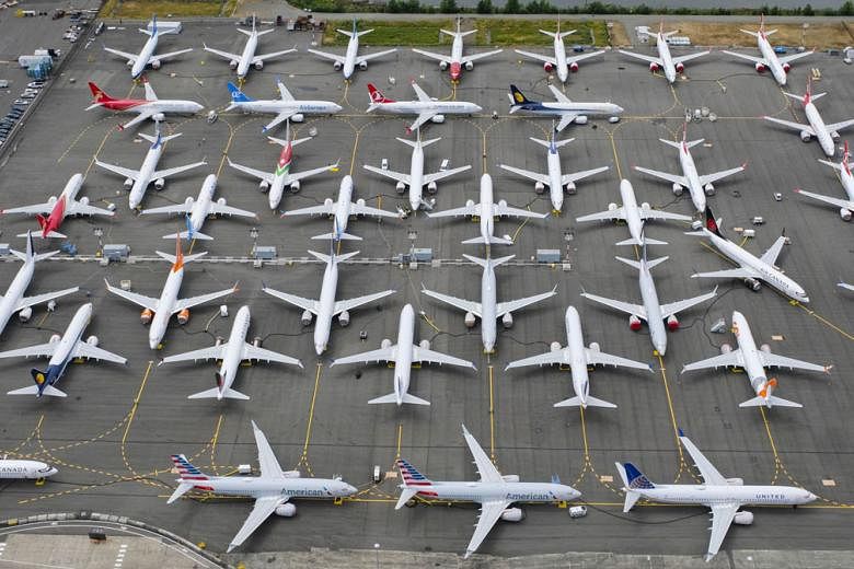 B-737 Max airplanes stored in an area adjacent to Boeing Field in Seattle, Washington. The management shake-up marks a shift in the US planemaker's focus towards getting its best-selling jet back in the air.