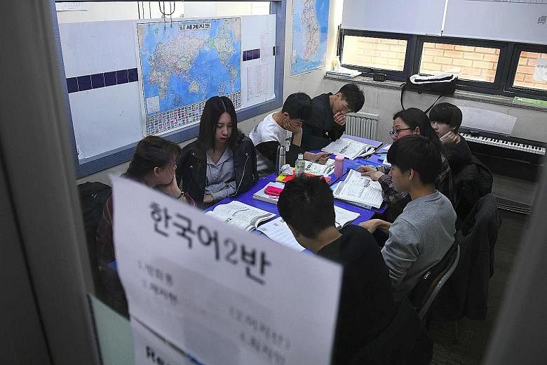 Students at Wooridul School in Seoul, one of seven special academies across South Korea offering defectors free education.