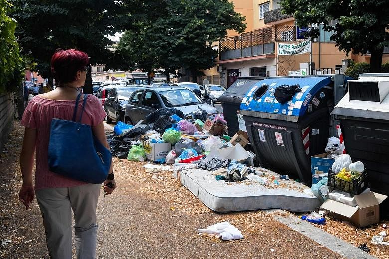 Overflowing trash bins in Rome. Of the city's three main landfills, one has closed and the others were ravaged by fire recently. Two biological treatment sites have reduced their activities for maintenance work. Doctors are warning families to steer 