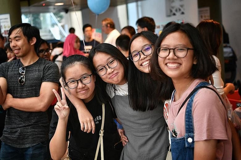 Cast member Nichelle Seow (in grey) with her friends at yesterday's launch of the film, My Face. Born with a cleft lip, she had corrective surgery when she was about four to five months old. She said she gets teased and called names, but has learnt t