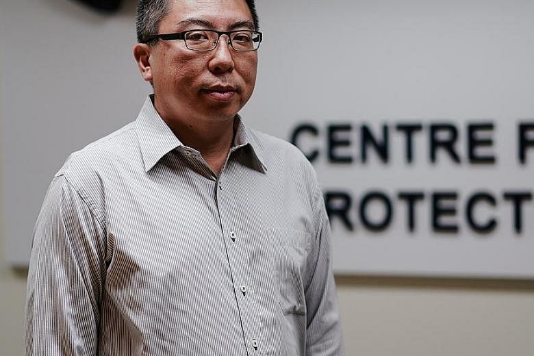 Centre for Protective Security director Andy Tan says the centre became a department under the Singapore Police Force because it shares similar functions as the police. ST PHOTO: ONG WEE KIAT