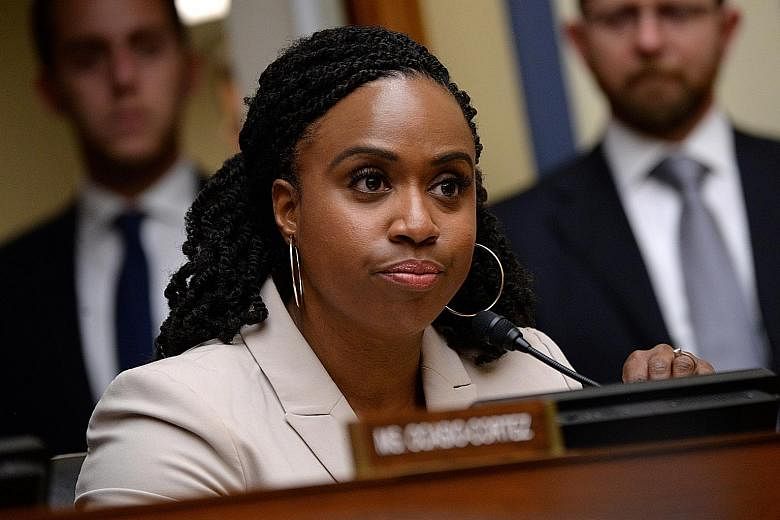 Ms Ayanna Pressley was born in Cincinnati. She and the other three members of "the squad" have hit back at Mr Donald Trump over his remarks. PHOTO: REUTERS Above: Ms Ilhan Omar (in front) and Ms Rashida Tlaib are the first two Muslim women in Congres