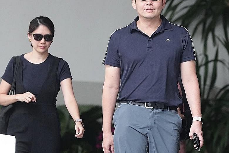 Kelvin Liu Chin Chan (left) leaving the court yesterday with Madam Lin, who The Straits Times understands is now his wife. Liu was found guilty of one charge under the Protection from Harassment Act brought by his then alleged lover's husband, civil 