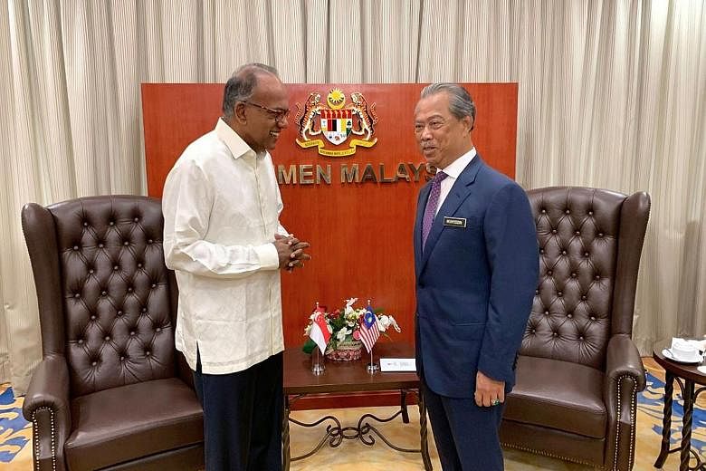 Singapore's Home Affairs Minister K. Shanmugam (far left) with his Malaysian counterpart Muhyiddin Yassin in Kuala Lumpur yesterday. PHOTO: K. SHANMUGAM/ FACEBOOK