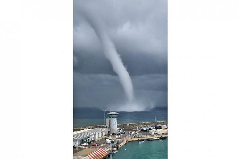 A video grab showing a spectacular waterspout off the coast of Bastia, on the French island of Corsica, yesterday as the island was ravaged by storms and rain. In some places, the downpour reached 60mm in less than an hour. Waterspouts typically form