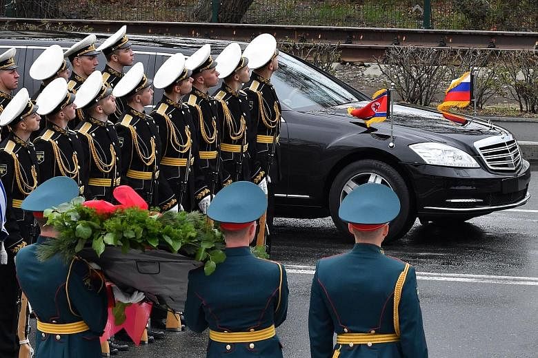 North Korean leader Kim Jong Un arriving in his limousine for a wreath-laying ceremony at a World War II memorial in the far-eastern Russian port of Vladivostok in April. Mr Kim is using the car in open defiance of UN sanctions intended to ban luxury