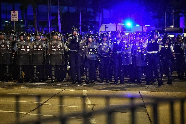 Hong Kong's 32,000-strong police force has found itself in the firing line of public anger. Among those singled out for specific retribution are a small group of expats who were some of the commanding officers on the front lines during clashes with p