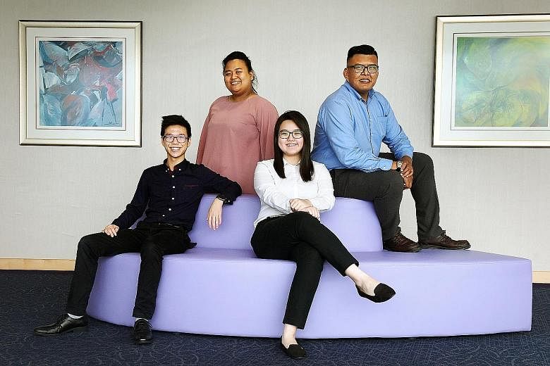 ITE graduates who received awards included (from left) Mr Nathaniel Neo, 19, winner of the IES Engineering Award; Ms Siti Nurhajah Haron, 24, and Ms Nicole Goh, 18, who were both given the Lee Kuan Yew Gold Medal; and Mr Muhammad Khairul Johari Jumah