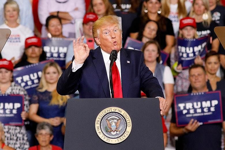 President Donald Trump at a rally in Greenville, North Carolina, on Wednesday, where he attacked his Democratic rivals, in particular four congresswomen. PHOTO: REUTERS