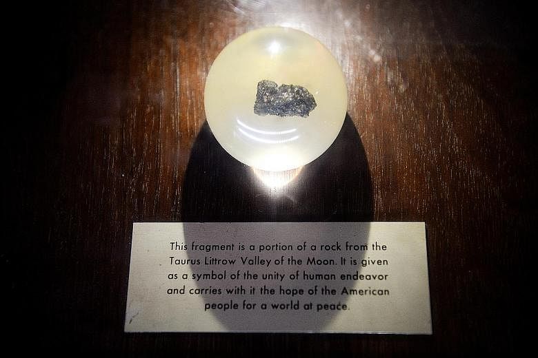A moon rock fragment on display at the Science Centre Singapore's Moonshot 50 exhibition. 