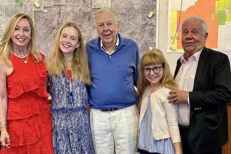 (From left) The writer, her daughters and husband with Mr T. Boone Pickens (centre), 91, the last living old-school oil tycoon, who made his fortune as a “wildcatter” – hunting for oil in unproven soil.