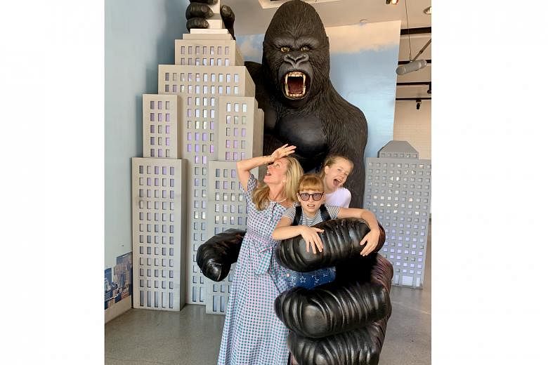 The writer and her daughters get to grips with King Kong at Madam Tussauds Hollywood.
