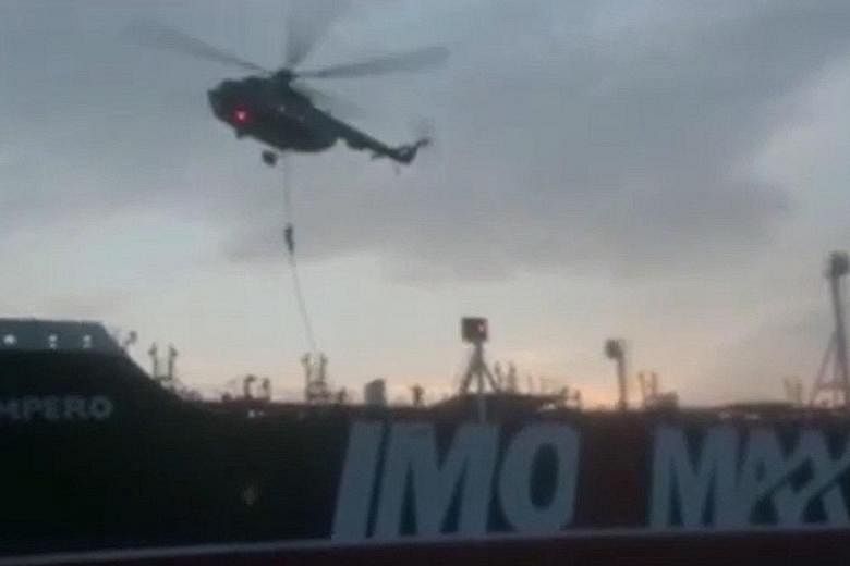 An image grab from a video provided by Iran's Revolutionary Guard official website shows Iranian forces boarding the British-flagged tanker Stena Impero in the Strait of Hormuz last Friday.