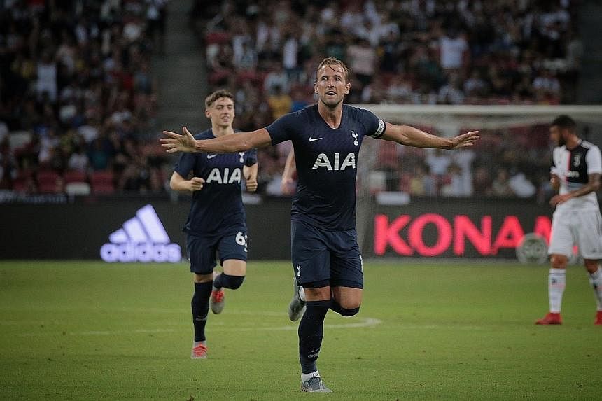 Tottenham striker and captain Harry Kane celebrates after scoring the winner - a stupendous lob from near the halfway line - in the 3-2 win over Juventus last night. 