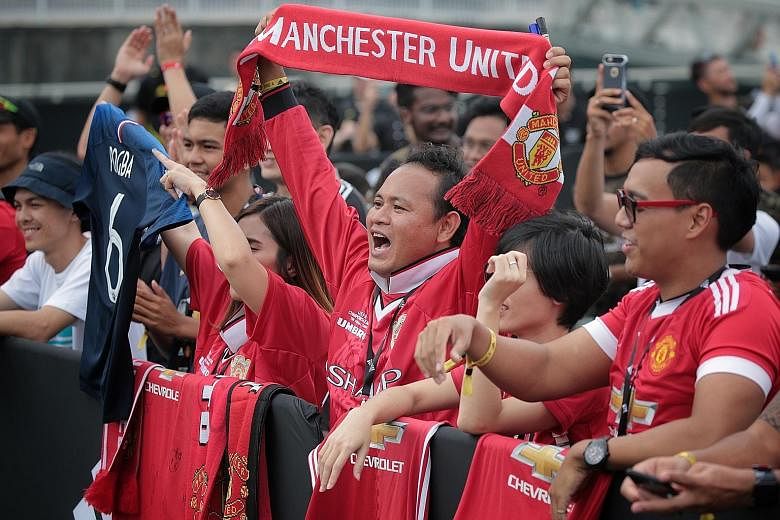Manchester United fans at The Float @ Marina Bay.
