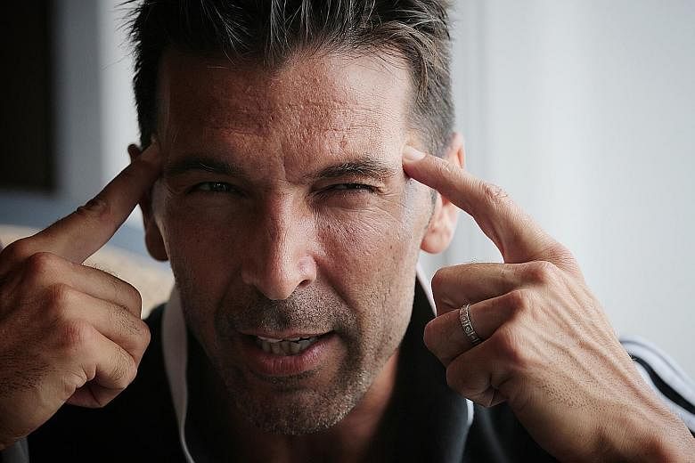 Gianluigi Buffon, who was in town with Juventus for the International Champions Cup, says he will continue playing so long as he still has dreams and the energy to do it. ST PHOTO: JASON QUAH