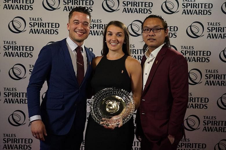 Head bartender Sophia Kang and assistant bar manager Gabriel Carlos (both above) of Manhattan, which won Best International Hotel Bar. Above from left: Head bartender Jesse Vida, general manager Annabelle Joyce and senior bartender Russell Ong of Atl