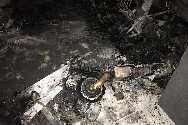 The blaze at a Bukit Batok flat last Thursday was linked to three e-scooters found burnt in the unit. Home owner Goh Keng Soon was pulled out of the burning flat, and died two days later in hospital. PHOTO: MURALI PILLAI/FACEBOOK