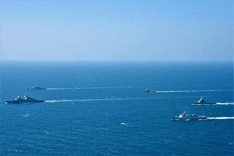Singapore and Indonesian navy vessels sailing in formation during the 25th edition of Exercise Eagle Indopura, the Singapore Armed Forces' longest-running bilateral exercise with a foreign military.