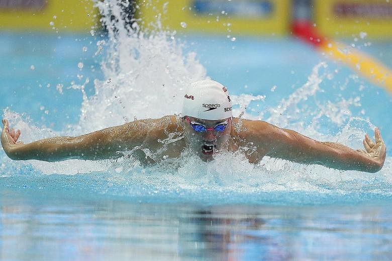 Joseph Schooling swimming the 100 metres butterfly at the World Swimming Championships in Gwangju, South Korea, yesterday. The Olympic champion clocked 52.93sec to finish eighth in his heat. He was ranked joint-24th with Canada's Josiah Binnema and d