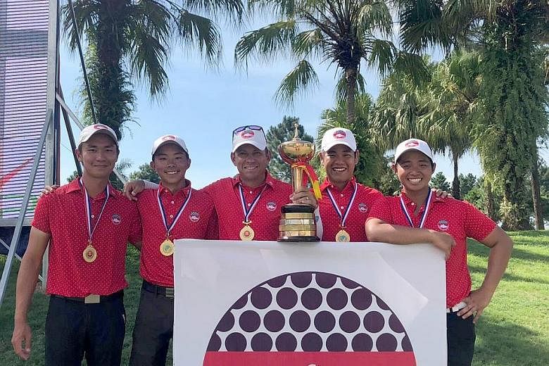 Singapore's victorious Putra Cup team (from left) Donovan Lee, Justin Kuk, national coach Matt Ballard, Low Wee Jin and Nicklaus Chiam. The success is a confidence-booster for the SEA Games in the Philippines at the end of the year.