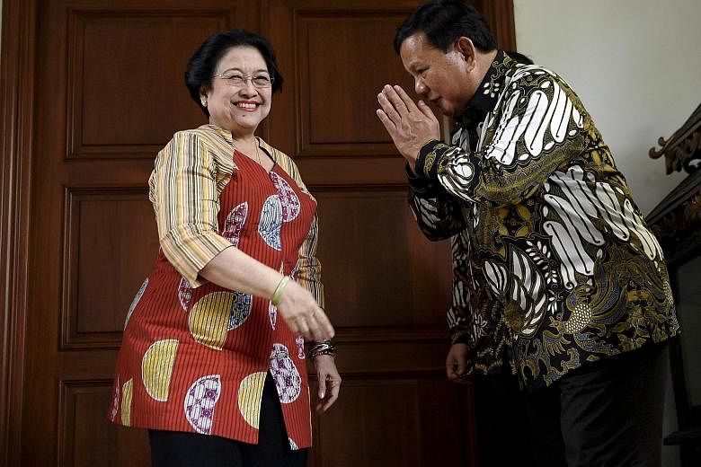 Head of Indonesia's opposition party Gerindra, Mr Prabowo Subianto, meeting Ms Megawati Sukarnoputri, chief of ruling party Indonesian Democratic Party of Struggle, last Wednesday. PHOTO: ANTARA FOTO