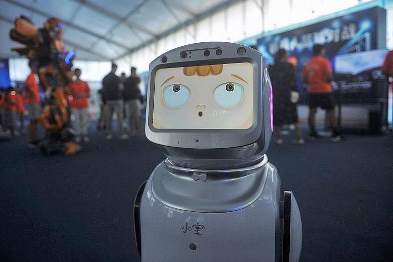 A robot at an exhibition in Qingdao, China. Artificial intelligence refers to computer-controlled robots or systems which can perform the tasks that a human can. It tries to simulate intelligent behaviour and human traits such as decision-making, and