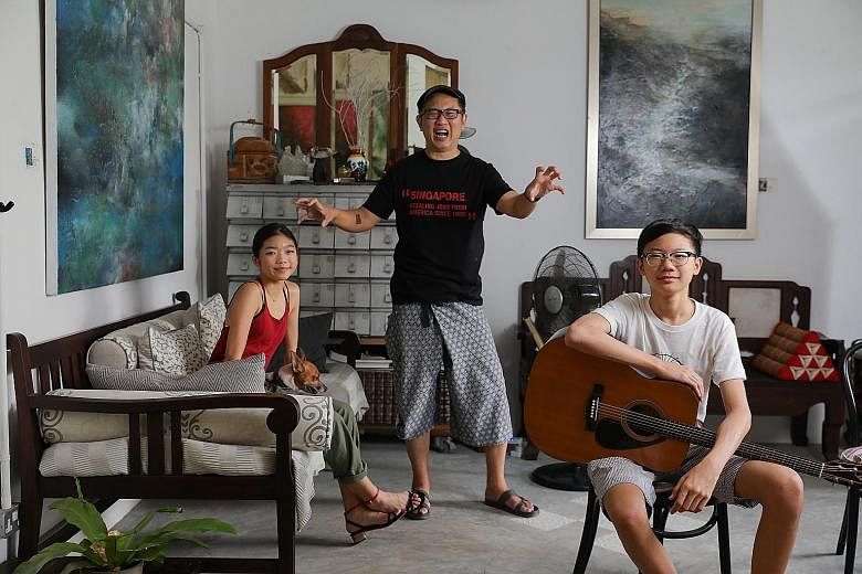 Mr Calvin Soh (centre), an adman turned farmer and product innovator, encourages his children Ava (left) and Dylan to take on projects outside school as he wants them to be creative individuals because "creativity is the new superpower", he says. ST 