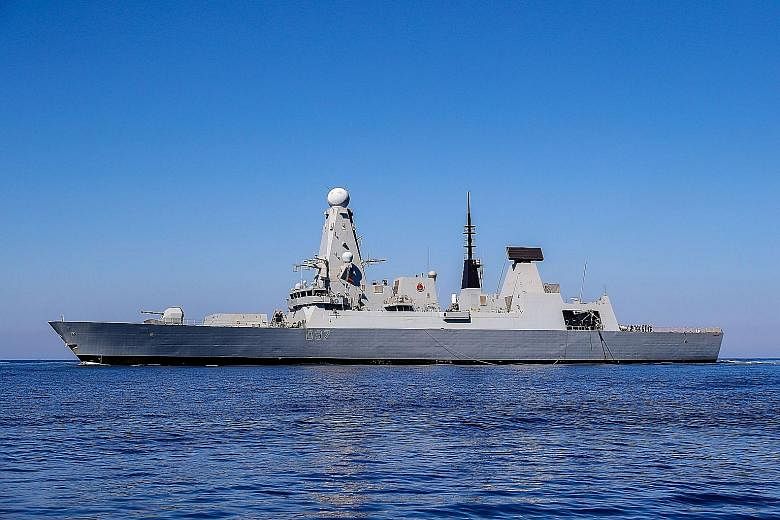 The HMS Duncan, a British Type 45 destroyer, sailing in the Mediterranean Sea off Crete. It will shepherd British-flagged ships through the Strait of Hormuz. PHOTO: AGENCE FRANCE-PRESSE/CROWN COPYRIGHT 2019