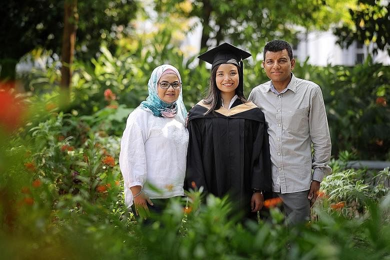 Singapore Management University graduate Farah Abdul Malik with her parents, Madam Fatimah Alwi and Mr Abdul Malik Rahman Shah. Ms Farah is currently enrolled in a two-year fast-track Master of Philosophy in Psychology programme at the university.